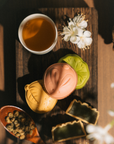 Qi-Cha Moonlit Indulgence Gift Tin (4 Mooncakes + 12 Tea Sachets)