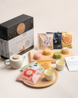 Qi-Cha Moonlit Indulgence Gift Tin (4 Mooncakes + 12 Tea Sachets)